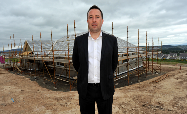 Pictured, managing director of Roy Homes, Chris Barnett.