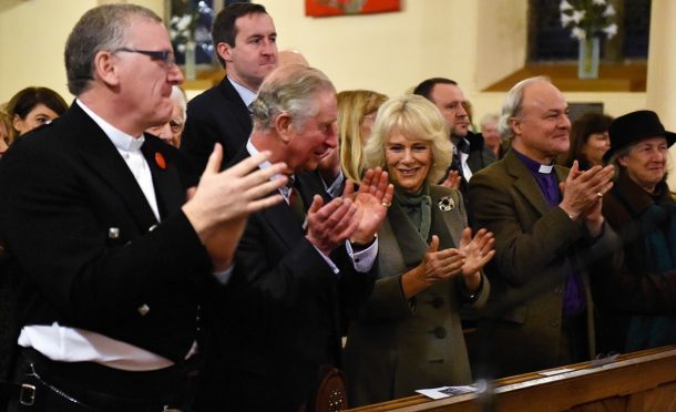 The Prince Charles, Duke of Rothesay and The Dutchess of Rothesay, attended a performance of Robert Burns poetry with music by Professor Paul Mealor and the Aberdeen University Chamber Choir, at Glenmuick Church, Church Square, Ballater.
Pictures by Colin Rennie.