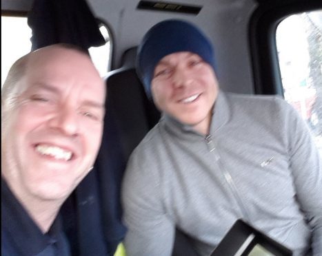 Olympic cycling hero Sir Chris Hoy with gritter driver Stevie.