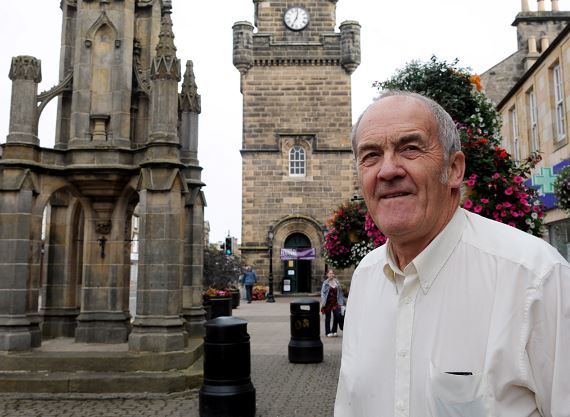 Forres councillor George Alexander would like empty buildings in the town brought back into use.