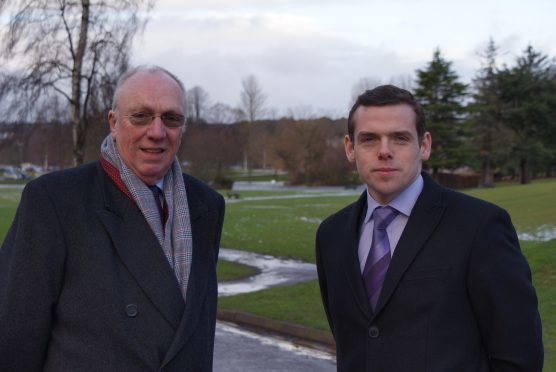 Highlands and MSP Douglas Ross, pictured right, has praised the experience of Elgin City North candidate Frank Brown.
