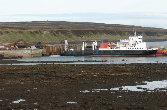 A ferry boat leaving Gills Bay destined for St Margaret’s Hope on Orkney