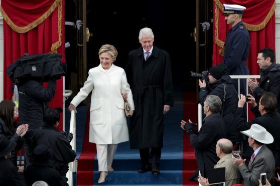 Former President Bill Clinton and former Democratic presidential nominee Hillary Clinton arrive on the West Front of the U.S. Capitol