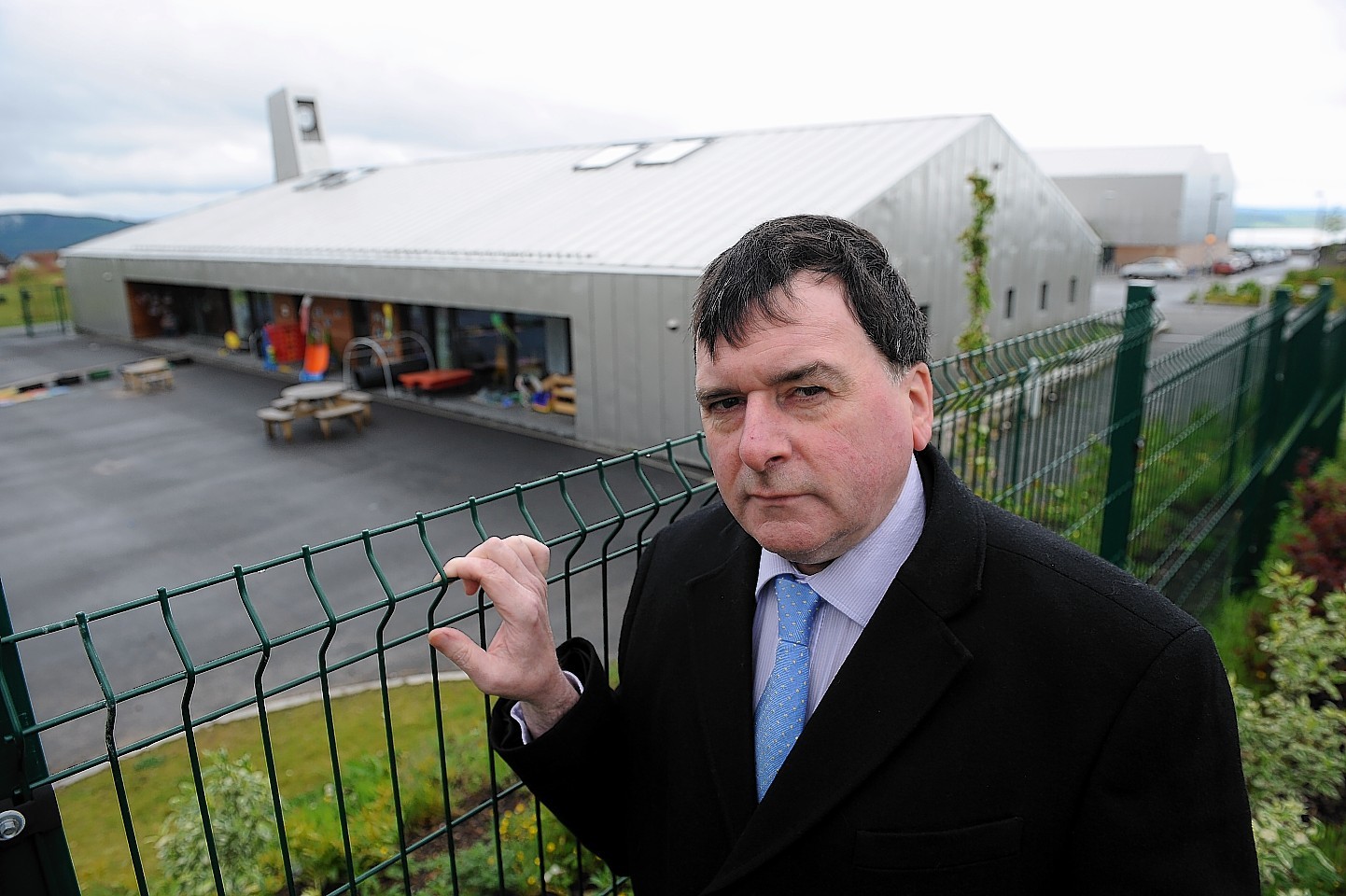 Councillor Ken Gowans is unaware of any problems with the "fabric" of the school.