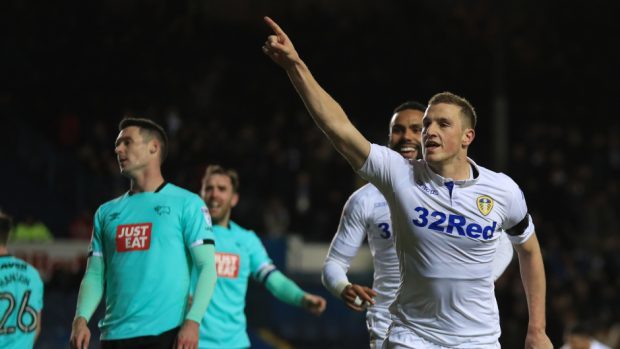 Burnley attacker Chris Wood scoring for Leeds.