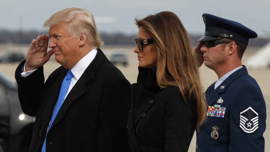 President-elect Donald Trump salutes as he and his wife Melania arrive at Andrews Air Force Base (AP/Evan Vucci)