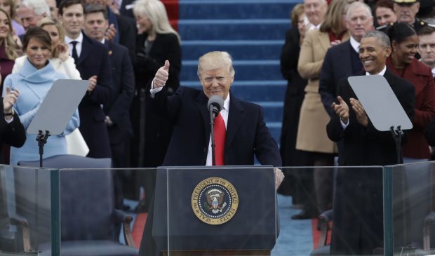 President Donald Trump gives a thumbs after being sworn in as the 45th president of the United States during the 58th Presidential Inauguration at the U.S. Capitol in Washington, Friday, Jan. 20, 2017. (AP Photo/Patrick Semansky)