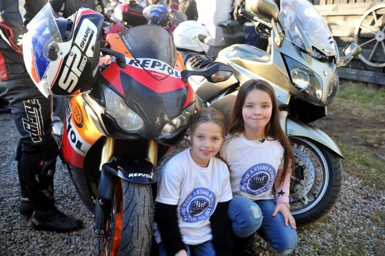 Skye and Kerry Mason at their home in Bogroy, Tore, after being surprised by a visit from Bikers Against Bullies UK.
Picture by Gordon Lennox