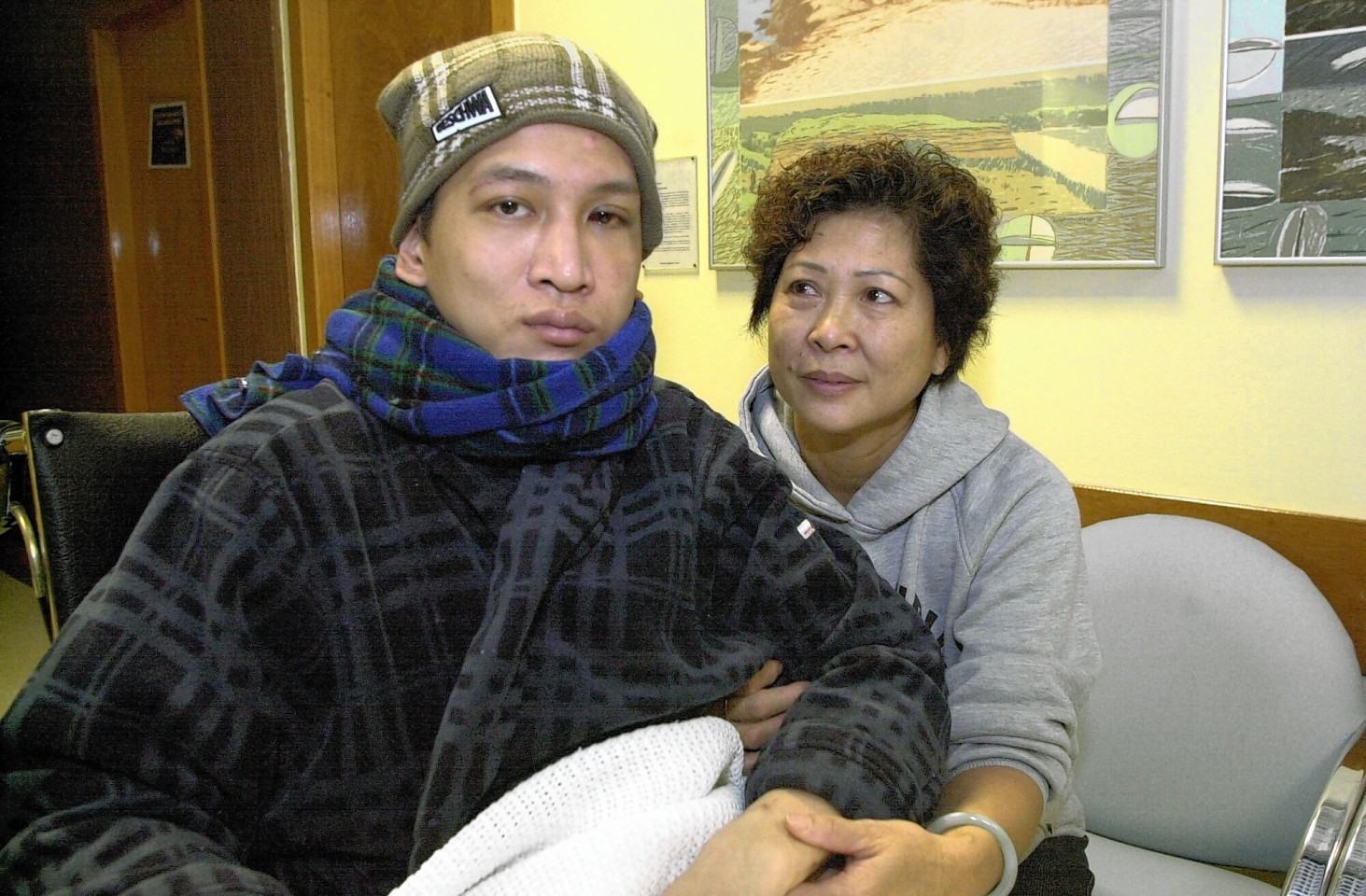 Terry Ho with his mum Yuk Yingleung recovering in ARI.