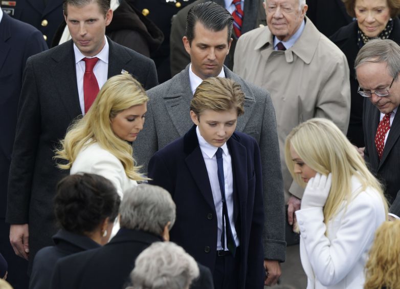 President-elect Donald Trump's children look for the seats before the 58th Presidential Inauguration at the U.S. Capitol for President-elect Donald Trump in Washington,