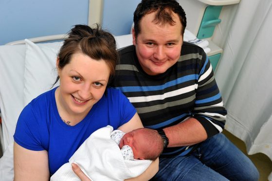 Kristine Licite and Viktor Galaktionovs, from Latvia, with their first-born, Martin.