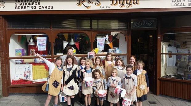 Last year's cast of Annie fundraising in Fraserburgh