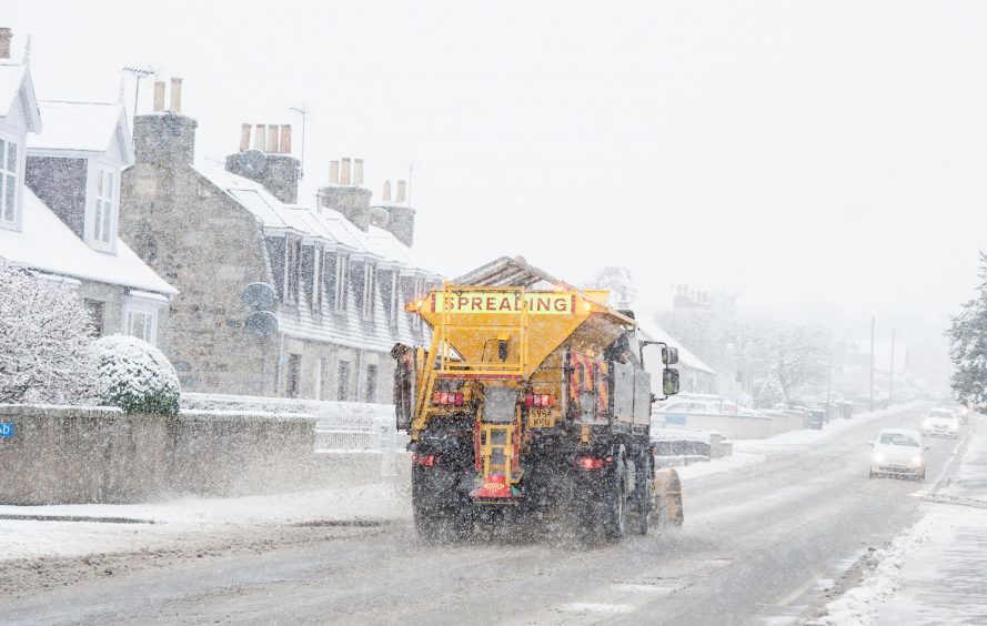 Snow plough makes its way through Alford