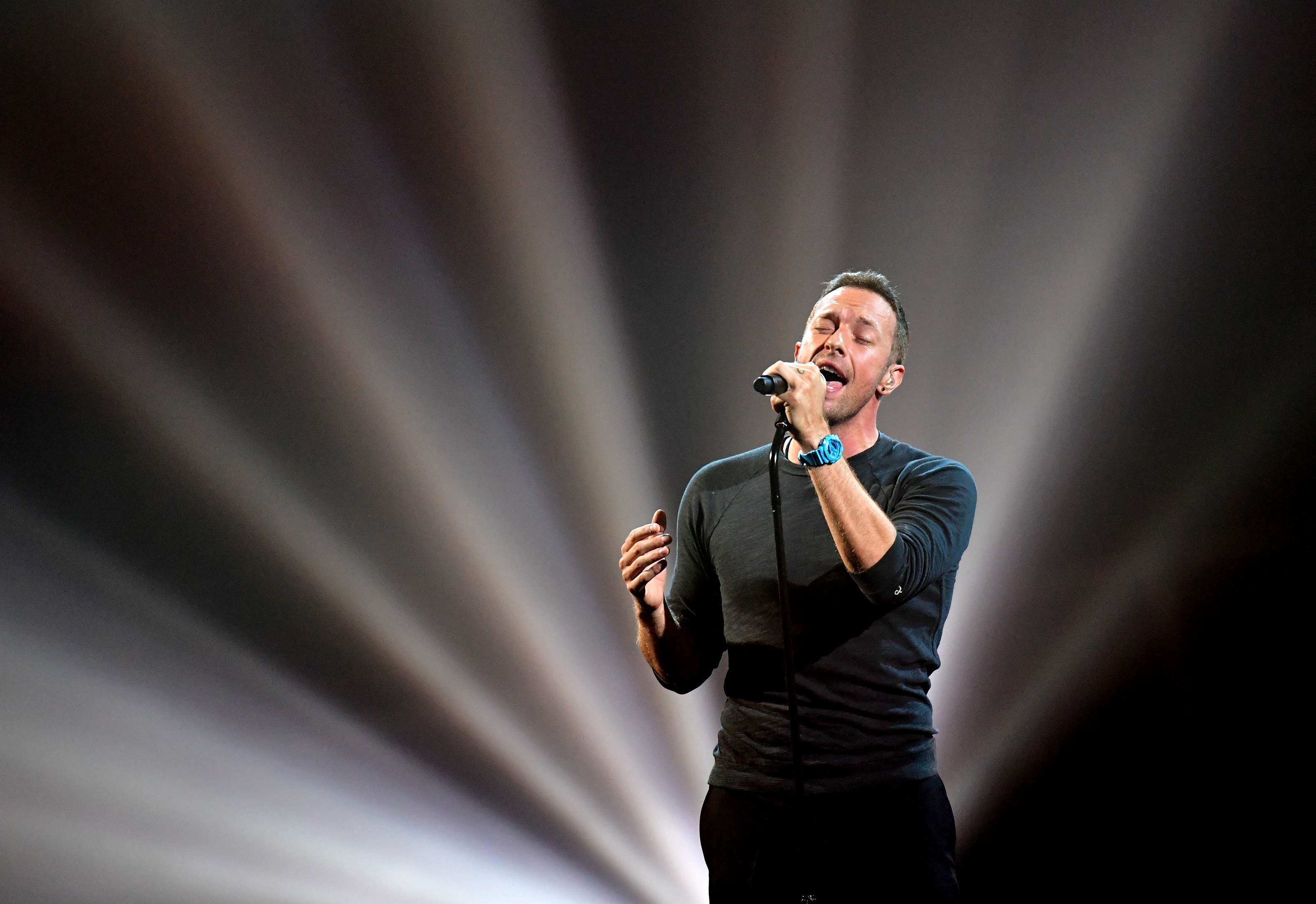 Coldplay's Chris Martin performs a tribute to George Michael on stage at the Brit Awards at the O2 Arena, London.