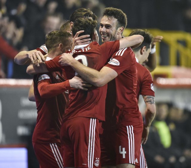 Aberdeen's Ryan Chistie celebrates with fellow goalscorer Andrew Considine as he scores the fourth