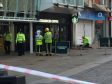 The scene in Wolverhampton city center after a woman died when she was hit by a piece of roof the "size of a coffee table