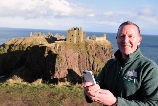 Visit scotland have an new virtual app showing Dunnottar Castle, Stonehaven. Inj the picture is Jim Wands from the castle. 
Picture by Jim Irvine  28-2-17
