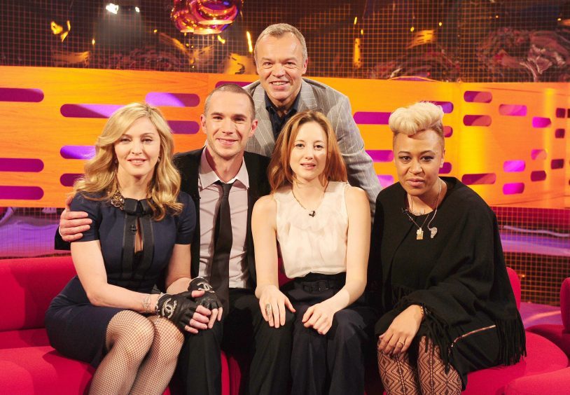 (From the left) Madonna, James D'Arcy, Andrea Riseborough and Emeli Sande pose with host Graham Norton in 2012