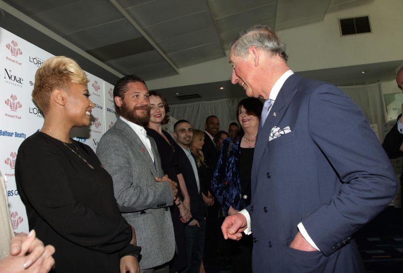 The Prince of Wales speaks with Tom Hardy, Emeli Sande (left) and Keeley Hawes (third left) during The Prince's Trust and L'Oreal Paris Celebrate Success Awards in 2012.