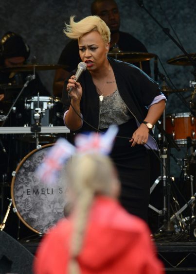 Emeli Sande on stage in George Square, Glasgow, Scotland in front of 16,000 people before the Olympic torch was brought onto the stage.