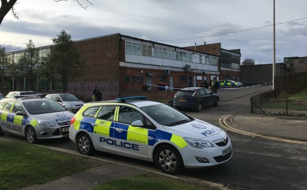 Police at the scene where the vehicle was set alight