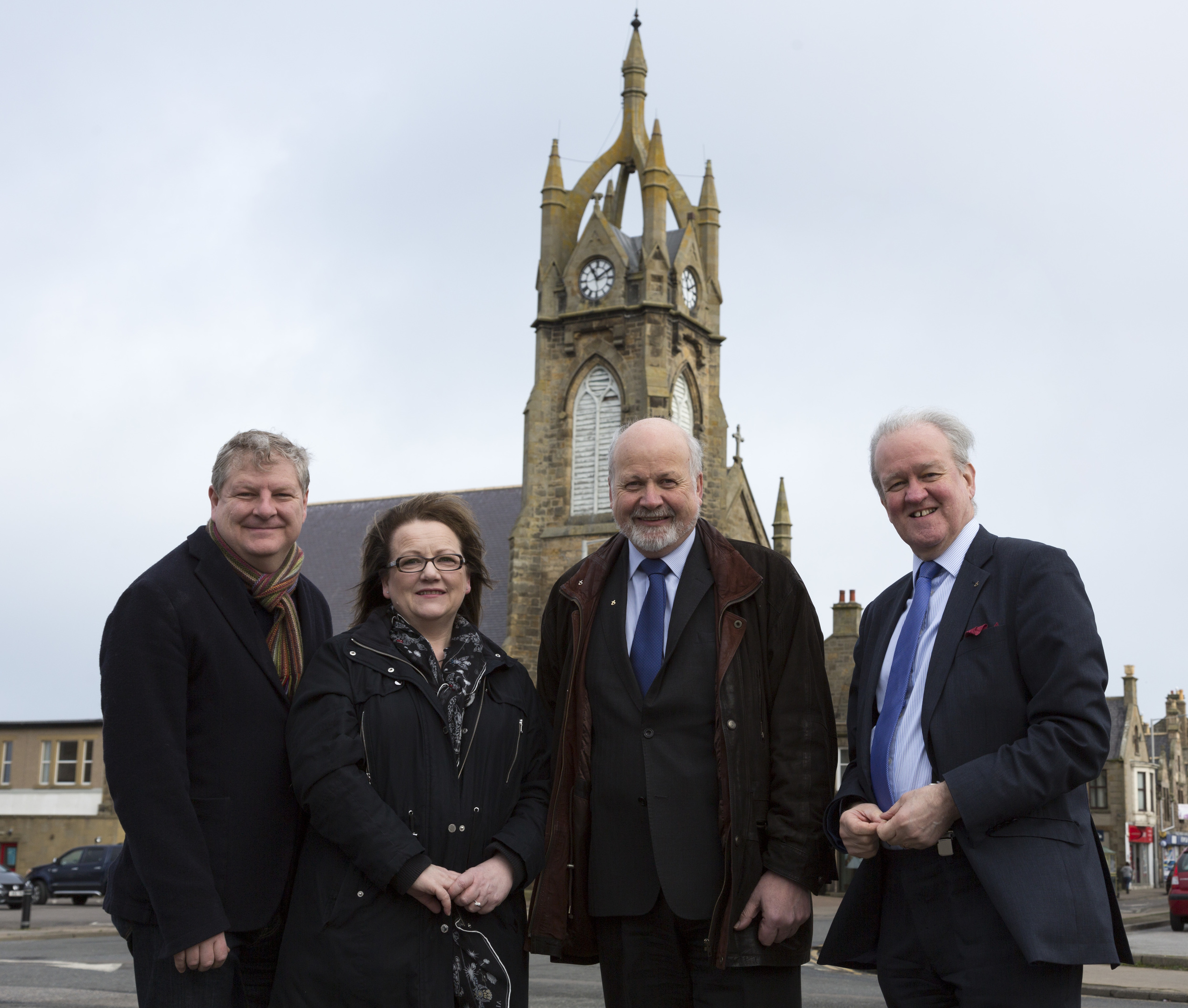 Moray MP Angus Robertson, left, and Banffshire and Buchan Coast MSP Stewart Stevenson, right, join Buckie councillors Sonya Warren and Gordon McDonald in the town's centre.