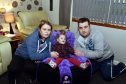 Jason Heath with partner Shaunie Stuart and their daughter Kelsie, 4, who suffers from Rett Syndrome at their home in Fraserburgh. Picture by Colin Rennie.