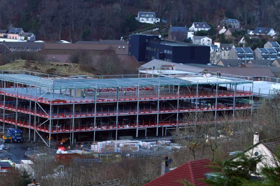 The construction of the new oban high school with the existing oban high school in the background picture kevin mcglynn