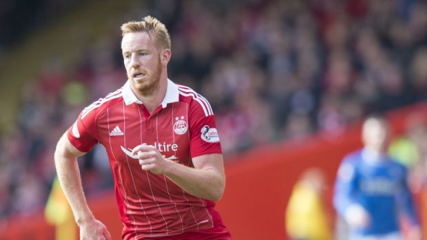 Adam Rooney scored a hat-trick for the Dons