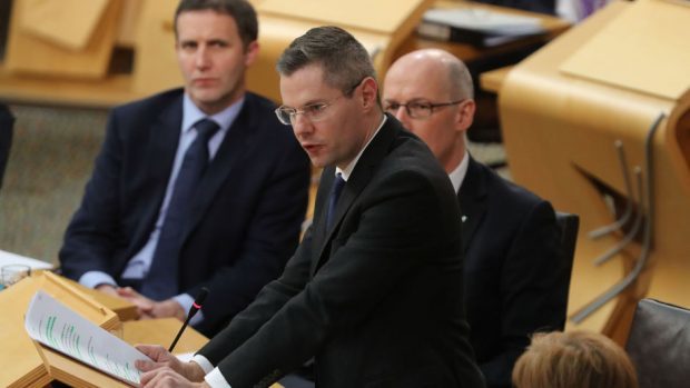 Finance Secretary Derek Mackay has said his Budget would protect low and middle income earners (Scottish Parliament/PA Wire)