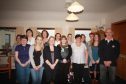 Caption: Seaforth House manager Tina Mitchell (front row centre) with some of the staff of the Golspie residential care home