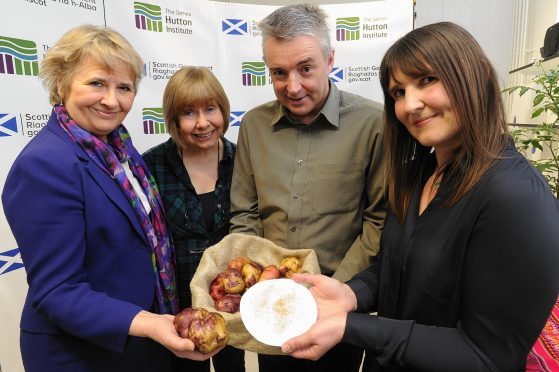 Environment Secretary Roseanna Cunningham with Jane Robertson, Glenn Bryan and Gaynor McKenzie from the Commonwealth Potato Collection.