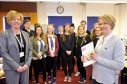 Lossiemouth High School pupils prepare for their World Host training with Moira Stickle, DYW manager for Moray, left, and Gail Cleaver, Johnstons of Elgin operations manager, right.