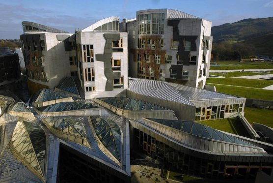 MSPs went back to the Scottish Parliament to discuss the coronavirus crisis.