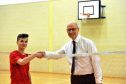John Swinney, right, with Sean McCann, an S3 pupil who beat him in a short badminton game.
Pictures by Gordon Lennox