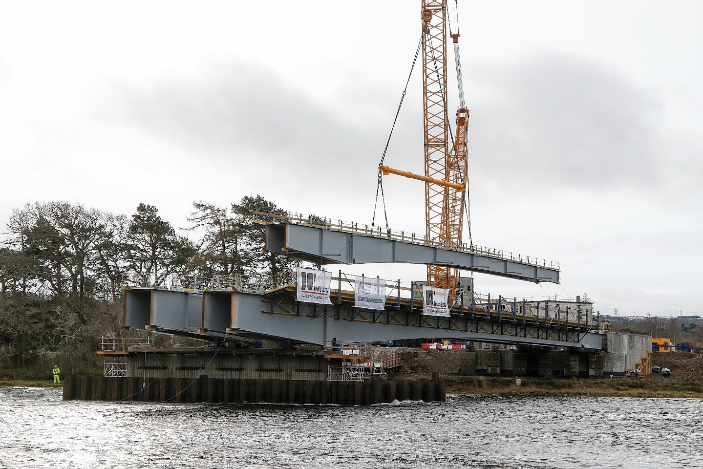 West Link bridge construction. The last of the three pairs of steel struts on the south side of the River Ness has been lifted in to place in a 3-hour operation. Picture: Andrew Smith