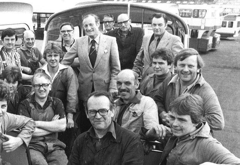 Councillor Ian Robertson with those who converted Grampian bus in 1980