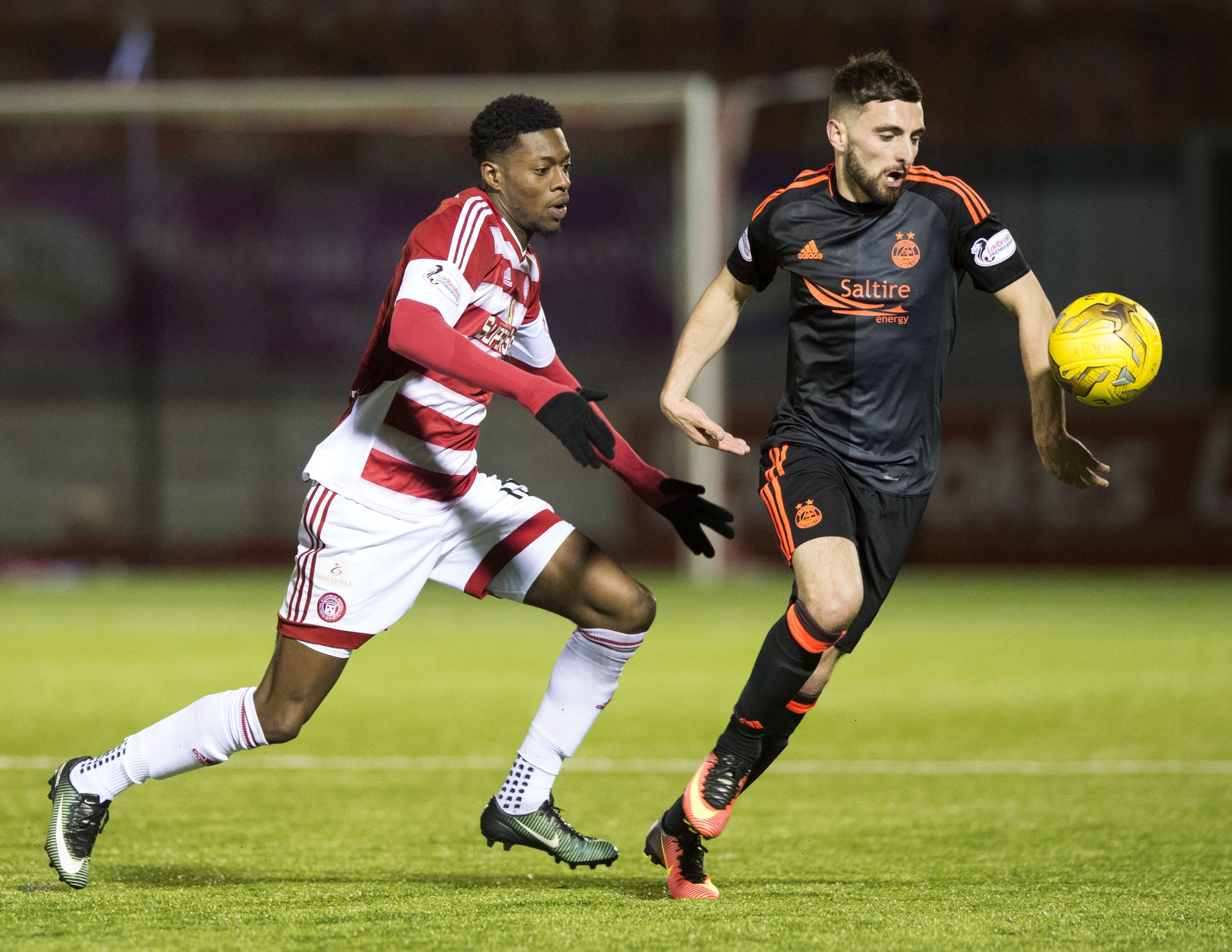 Aberdeen's Graeme Shinnie (R) in action in the 2016/17 away offering. Image: SNS.