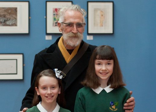 John Byrne pictured with Gordon Schools pupils Charlotte Stewart and Scout Knight.