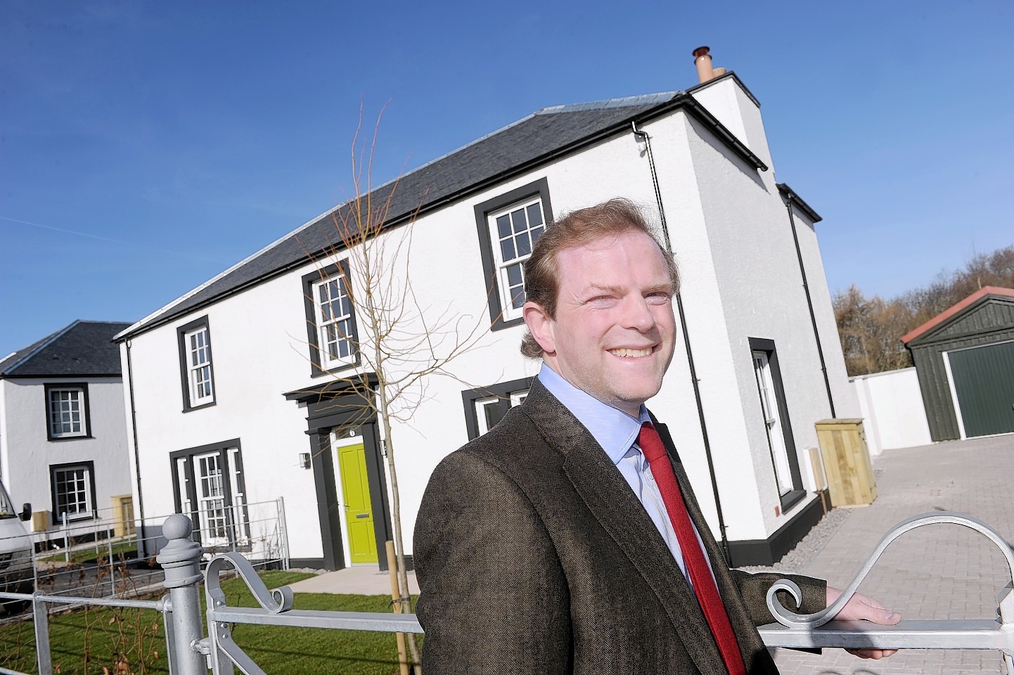 Lord John Moray photographed with some of the completed homes. Picture by Sandy McCook