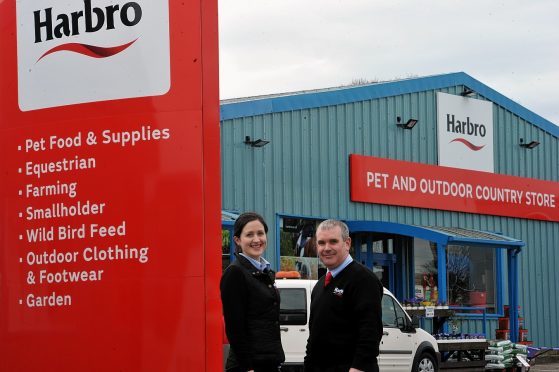 Elizabeth Patterson and John Allison at the newly re-branded store in Elgin.