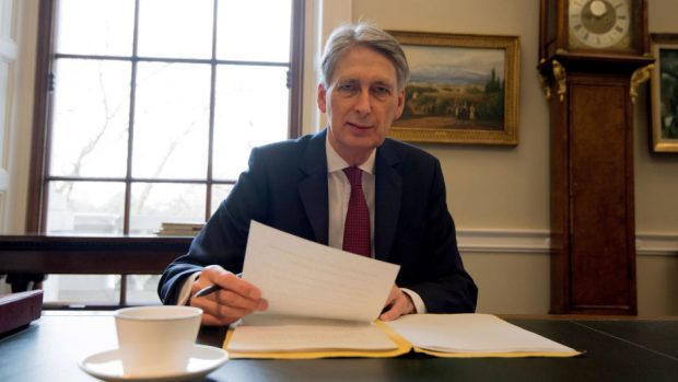 Chancellor Philip Hammond preparing his speech in Downing Street