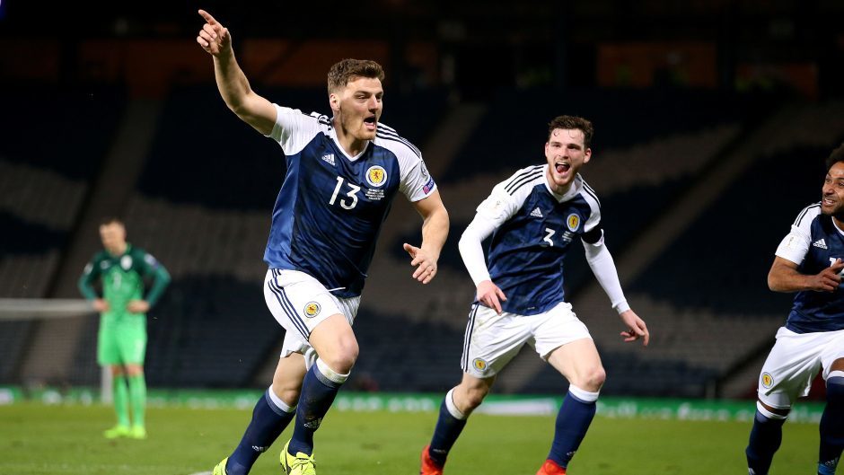 Scotland's Chris Martin, left, was delighted with his late winner