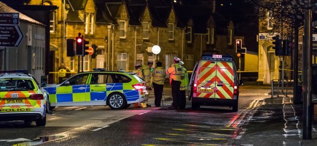 Police investigating at the scene of the incident in Inverness