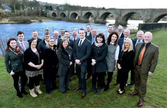 The SNP put forward 25 candidates in the coming election. They are pictured at Bridge of Dee. (front, from left) 
Catriona Mackenzie, Pamela McBain, Gill Samarai, Jackie Dunbar, Stephen Flynn, Lauren Wards, Jessica Mennie, Alison Alphonse, Gordon Townson. (back, from left) Michael Hutchison, Alex Nicoll, Derek Davidson, Jim Noble, Dell Henrickson, Christian Allard, Ciaran McRae, Bill Cormie, Alexander McLellan, Neil Copland, Joshua Mennie, John Cooke, David Cameron and Neil MacGregor.
Picture by COLIN RENNIE