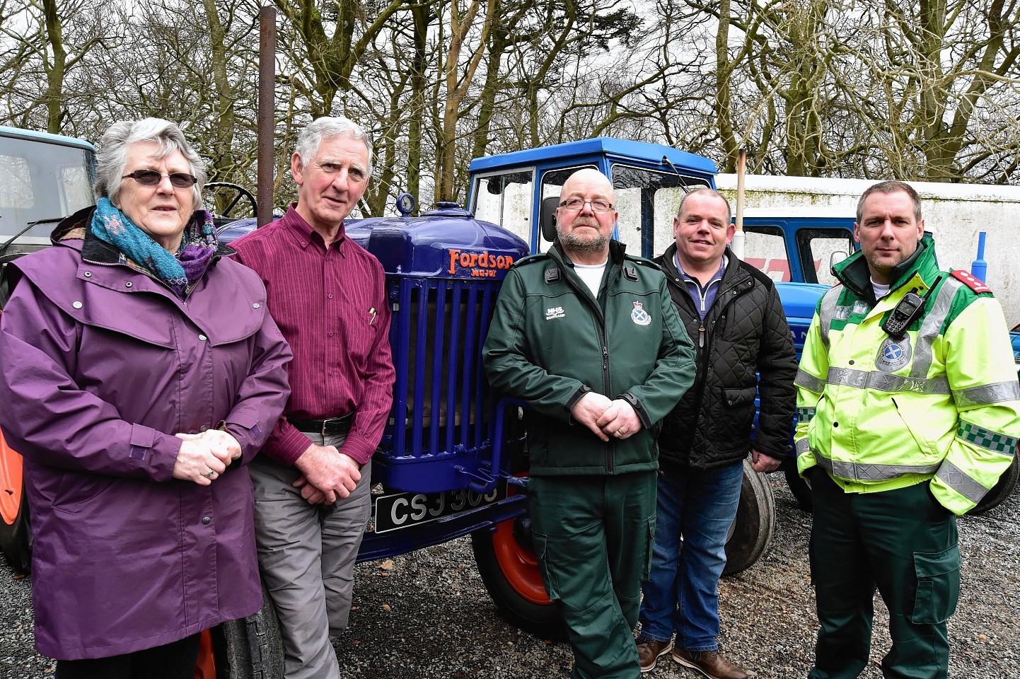(L TO R) ORGANISERS JANE AND BILL IRONSIDE, JAMES HENDRY, FRASERBURGH AMBULANCE STATION MANAGER, ALAN THAIN AND STEVE MUNRO, AIR AMBULANCE AREA SERVICE MANAGER