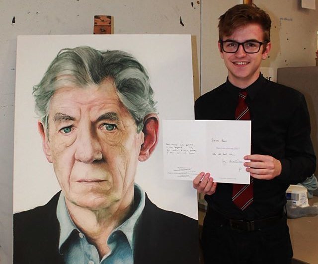 Steven Rae with his portrait of Sir Ian McKellen
