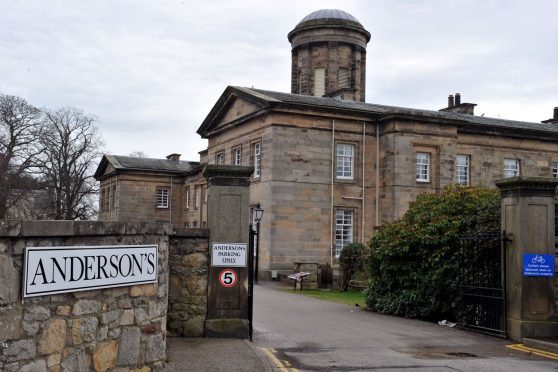 View of Anderson's Care Home through the gates.