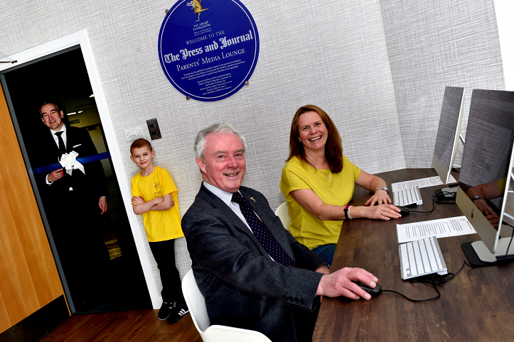 Press and Journal Media Lounge was officially opened by Editor in Chief Damian Bates. Pictured with Damian (is nine-year-old Finlay Thompson, mum Tracy and Joe Mackie, Chairman of ARCHIE (front). 