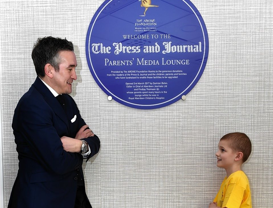 Editor-in-chief Damian Bates with nine-year-old Finlay Thompson at the launch. Pictures by Colin Rennie.